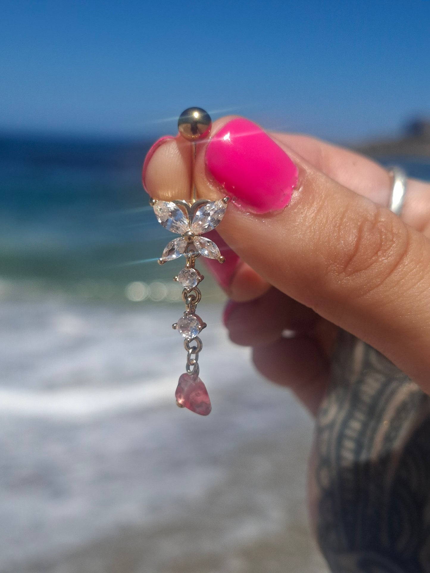 ethereal being ruby quartz belly bar 𐦍
