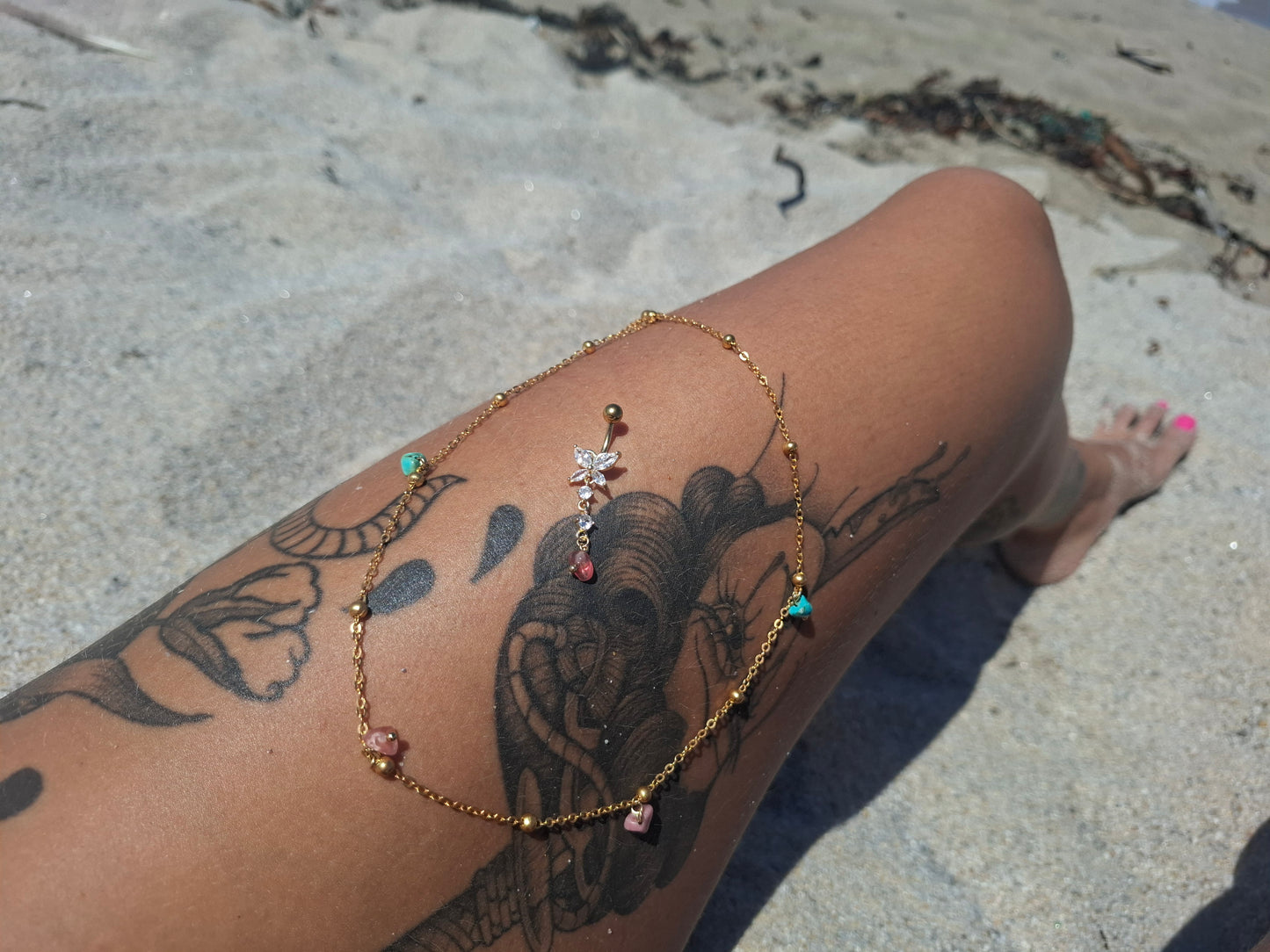 ethereal being ruby quartz belly bar 𐦍
